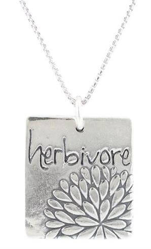 HERBIVORE Word Pendant with Flower Design